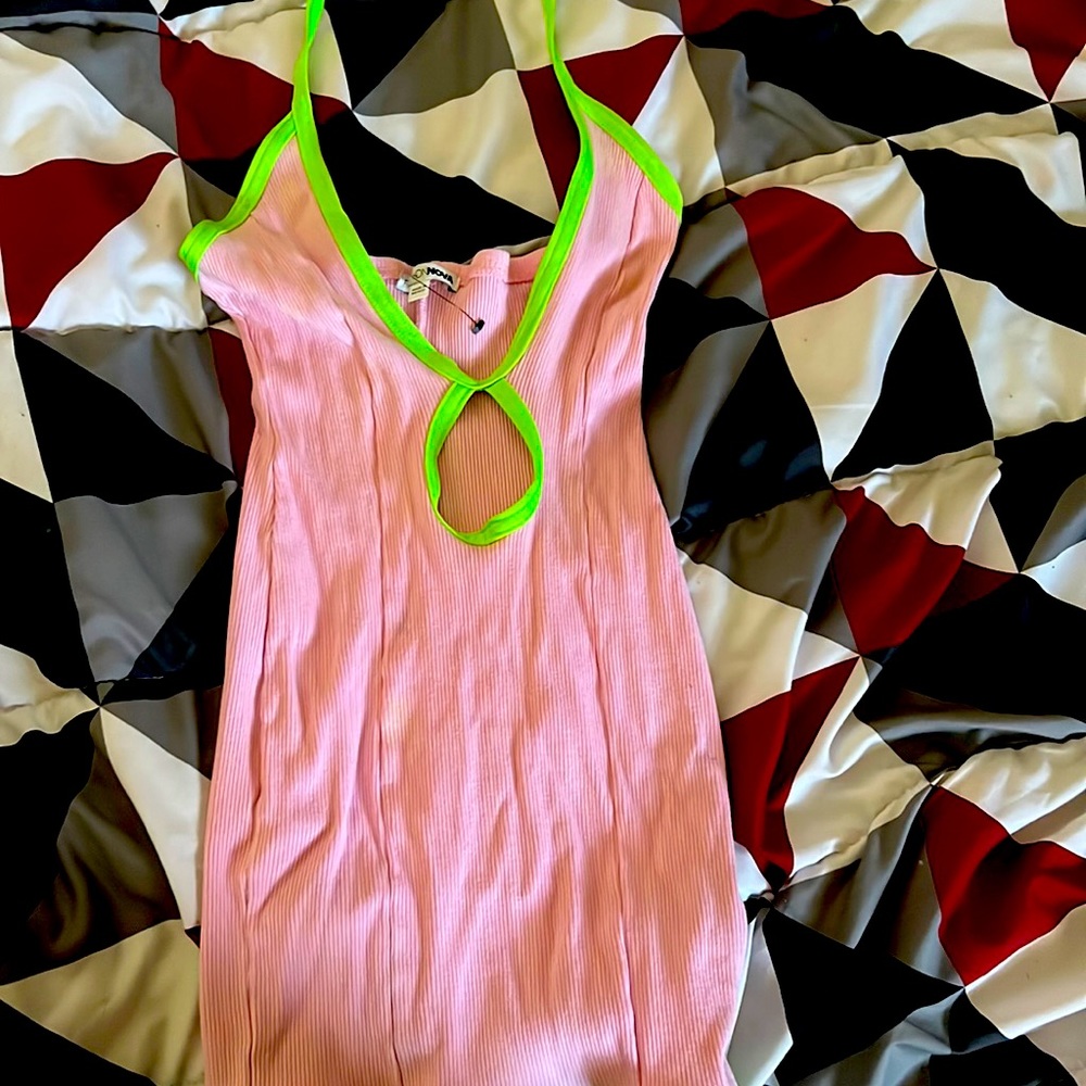 I am selling this pink & green fashion nova mini  bandage dress.